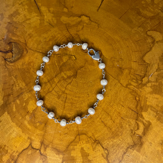 Freshwater White pearls on Sterling Silver wire with Large Sterling Silver Heart Lobster clasp, 9" on wood