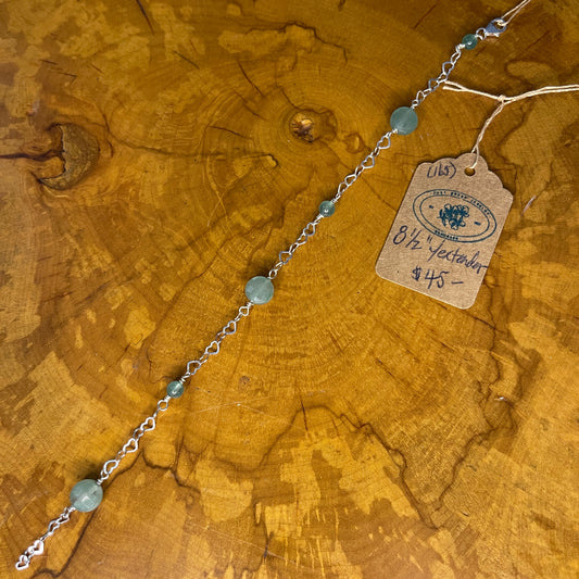 Aventurine on Sterling Silver heart Chain,8 inch with 1/2 inch extender and Sterling silver Lobster clasp on wooden surface with tag
