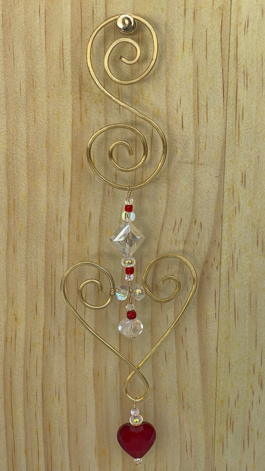 Heart shaped Decorative gold tone hammered metal wall/window Suncatcher with Red heart shaped crystal drop, 10"