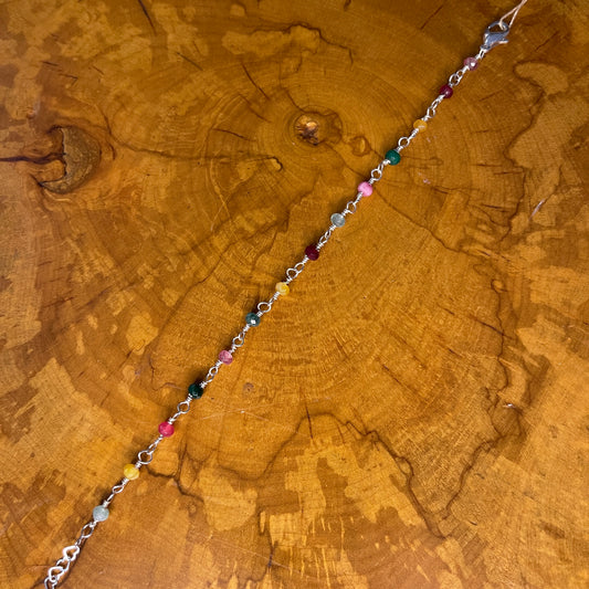 Multi colored Jade on Sterling Silver wire 7" with 1/2" Sterling heart chain extender,Sterling Silver Lobster clasp on wood